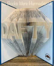 Load image into Gallery viewer, &quot;DAFTY&quot; hand folded into the pages of book : : Offensive Art : : Crude Books
